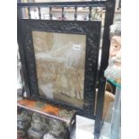 An ebonised embroidered fire screen. COLLECT ONLY.