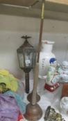 A brass coach lamp, a copper post horn and a copper washing dolly. COLLECT ONLY.