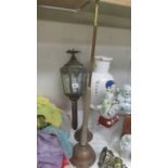 A brass coach lamp, a copper post horn and a copper washing dolly. COLLECT ONLY.