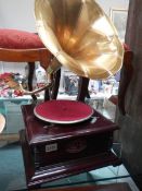 A 20th century horn gramaphone with brass horn. COLLECT ONLY.