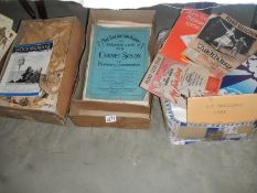 Three boxes of sheet music, woodworker and other magazines.