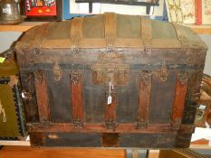 An old metal bound travelling trunk.COLLECT ONLY.