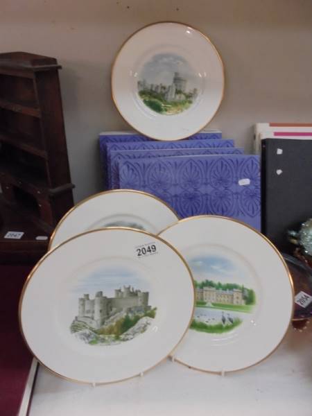 Four boxed Wedgwood castle scene collector's plates.