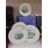 Four boxed Wedgwood castle scene collector's plates.