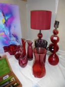 A mixed lot of red glass including a pair of table lamps. COLLECT ONLY.