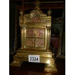 A Victorian brass centrepiece.