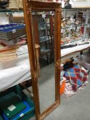 A long heavy gilt framed bevel edged mirror. COLLECT ONLY.