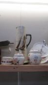 A large jug a/f, two ginger jars, a cake stand and a trinket pot.