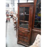 A mid 20th century corner cupboard, (small crack in glass), COLLECT ONLY.