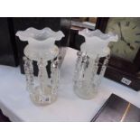 A pair of opaque glass lustres,