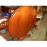 A Victorian mahogany circular tip top table in good condition, COLLECT ONLY.