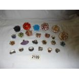 24 assorted dress rings.