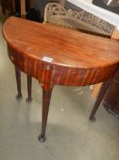 A late Victorian circular fold over table with storage space. COLLECT ONLY.