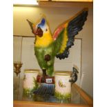 A large ceramic parrot with two feeding bowls. COLLECT ONLY.