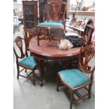 An excellent mahogany wind out dining table with 2 leaves and 6 chairs, COLLECT ONLY.