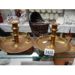 A pair of Victorian brass chamber candlesticks.