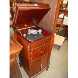 A tall mahogany cabinet gramaphone, COLLECT ONLY.