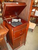 A tall mahogany cabinet gramaphone, COLLECT ONLY.