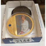 A Princess Diana portrait medallion and an 1819 medallion.