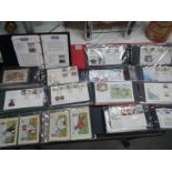 Eight albums of first day covers etc.,