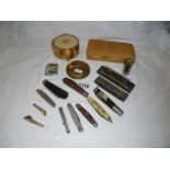 A mixed lot including pen knives, harmonica's, compact etc.,