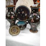 Five items of Cloisonne, vases, plates etc., (one with dent).