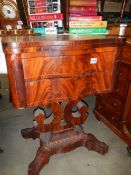 A Victorian mahogany fold over games table. COLLECT ONLY.