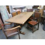 A good quality mid 20th century solid oak dining table with 2 carvers and 4 dining chairs, COLLECT