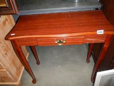 A mahogany single drawer side table. COLLECT ONLY.