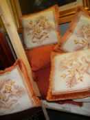 A mixed lot of cushions in good condition.