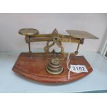 A set of brass letter scales.