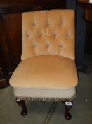 A Victorian style deep buttoned bedroom chair. COLLECT ONLY.