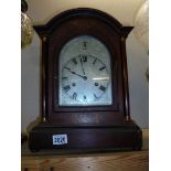 A mahogany inlaid 8 day bracket clock.