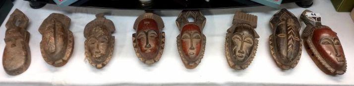 8 small African tribal masks