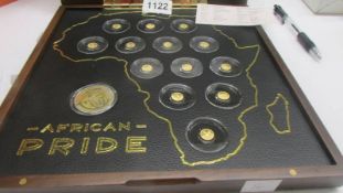 A cased set of 14 'African Pride 13 Nation' gold proof coins.