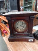 An Edwardian mantle clock with silvered dial, with pendulum, no key, both springs ok