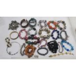 22 assorted bracelets including some in the style of Pandora.