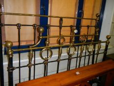 A late Victorian 4' 6" brass and iron bedstead, COLLECT ONLY.