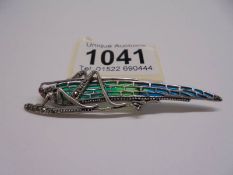 A ruby, pyrate and plique-a-jour enamel brooch designed as a grasshopper, stamped 925, length 7.2 cm