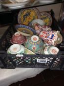 A mixed lot of oriental ceramics, rice bowls, plates etc.,