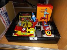 5 tin plate clockwork cars & a clown on a tricycle
