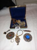 A mixed lot of brooches and rings