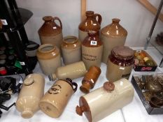 A quantity of stoneware, jugs, bottles, jars etc