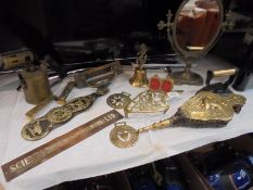 A mixed lot of brass ware including Victorian letter box, doorknocker, mirror, bellows,