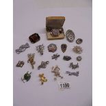 A good lot of mid 20th century brooches etc.,