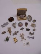 A good lot of mid 20th century brooches etc.,