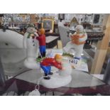 Three Coalport 'The Snowman' figures - Dancing With Teddy, Adding a Smile & Building a snowman