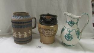 A Doulton Lambeth 'silicon' dish, a Doulton beer jug and a Victorian green & white jug.