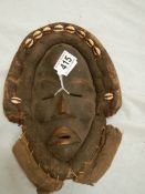 An African Dan style wall mask, 27 x 21 cm.