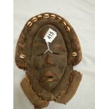 An African Dan style wall mask, 27 x 21 cm.